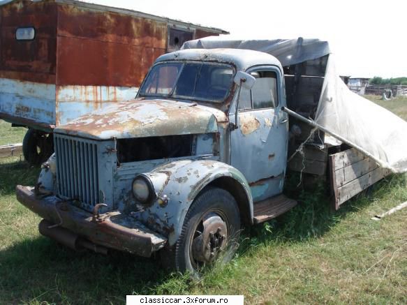 gaz (molotov) momentan foloseste bena camionului post depozit furaje.