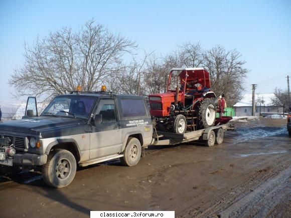 modalitati transport. pentru cei interesati fac tractari auto nissan patrol remorca. masina este