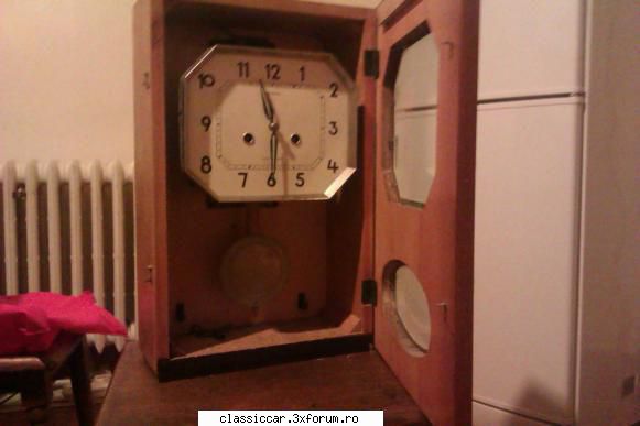 a doua poză cu cel de-al doilea ceas cu doua pendule