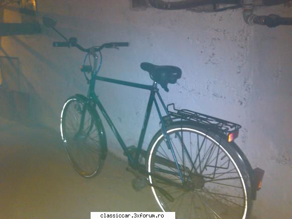bicicleta hartje inca pozelor este foarte buna deoarece pozele le-am facut pivnita blocului unde tin