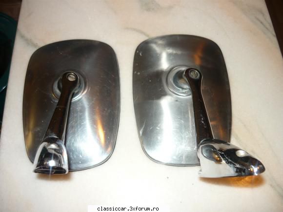 poza 2
spatele 
oginzile ,-sticla stare foarte buna oginzi aro din metal