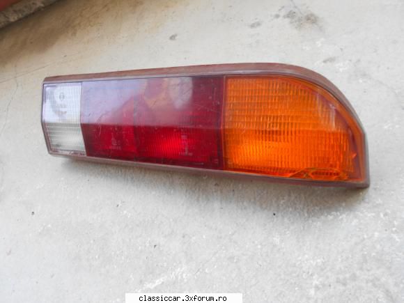 stop dreapta opel manta (bosch) usor deteriorat intr-un colt