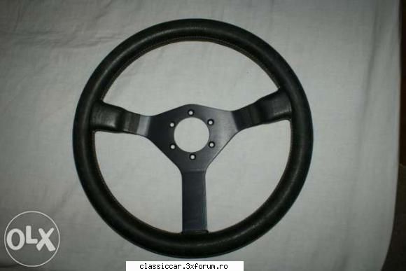 vand volan momo volan raid vand volan imbracat piele momo stare foarte buna.are cauciucul din