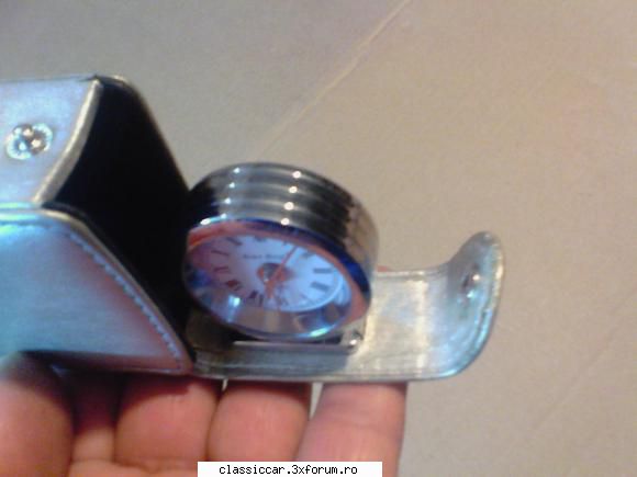 adaug un ceas foarte dragut si germania, construit integral din inox-crom, perfect ca este foarte