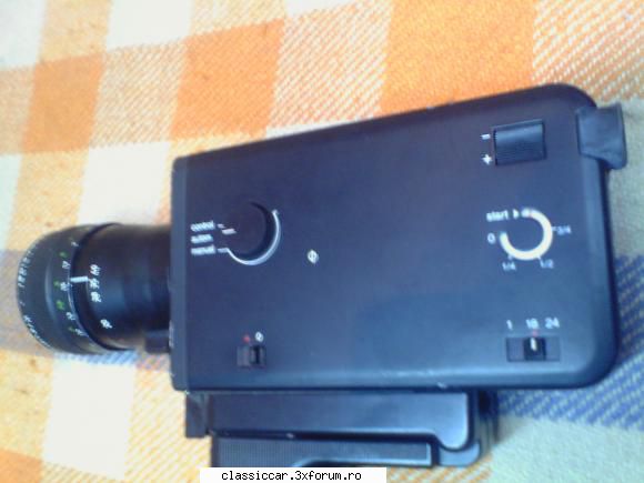 stare estetica absolut este cu 2 viteze (18 sau 24 cadre pe si poze 4 baterii r6

arata excelent, in