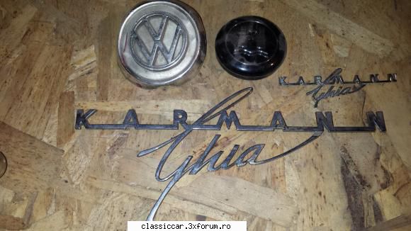 cateva accesorii adaug set embleme karmann ghia, scris mare pentru spate, scris mic partea laterala,