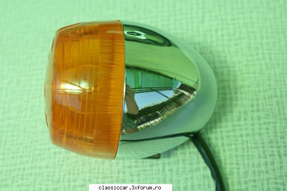 triumph bucata semnal (sau orice leiare zgarietura parte,se vede poza.
