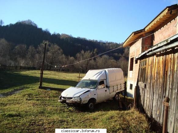 prin viseu, judetul curtea aia mai era dacie umpic avariata