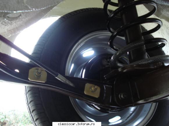 Dacia - detaliu tendon si butuc spate - Prezentare masini