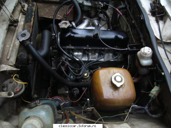 Fiat 124 - motorul de 1197 cmc si aproximativ 60 CP este - Prezentare masini
