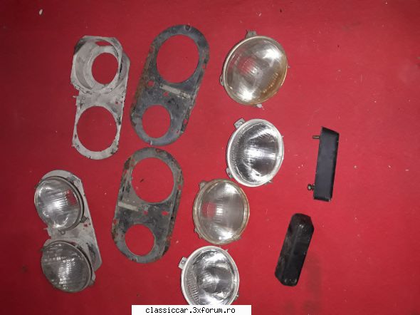 Lot piese Dacia - Set de faruri cu suporti si tampoane bara fata - Vanzari  piese si accesorii