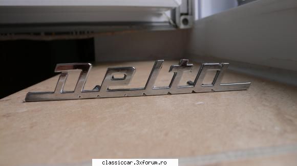 VAND Emblema bord DELTA pt. modele Dacia - Emblema bord DELTA in stare f. buna - Vanzari  piese si accesorii