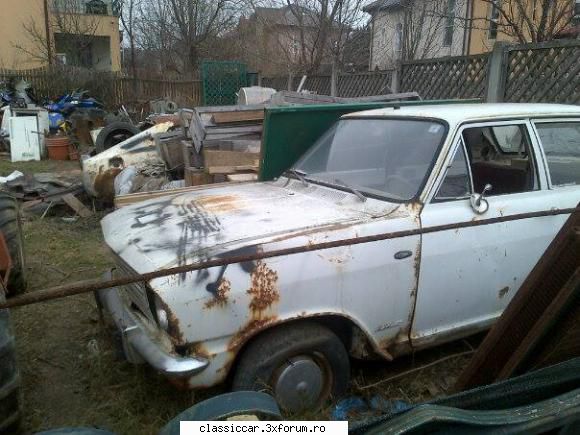 Vanatoarea de opeluri - kadett si un datsun in planul 2 - Am vazut prin Romania
