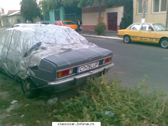 Vanatoarea de opeluri - cred ca este a propietarulului Bmw......ului - Am vazut prin Romania