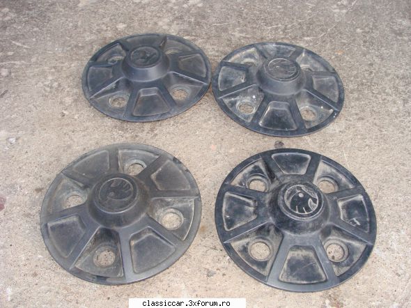 Vand piese auto(romanesti/straine),aparate radio si altele - capace roti Skoda - Vanzari  piese si accesorii