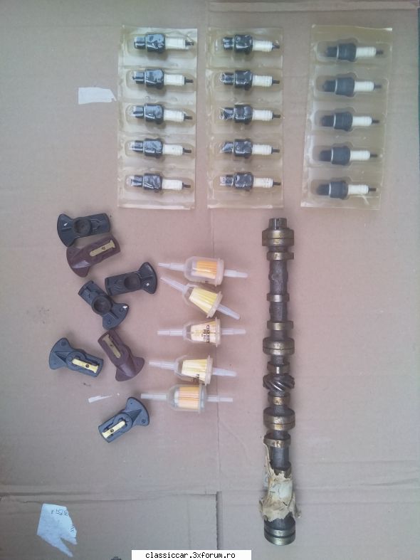 Vand piese dacia - Piese NOI: Filtru benzina-5 lei bucata Bujii-10 - Vanzari  piese si accesorii