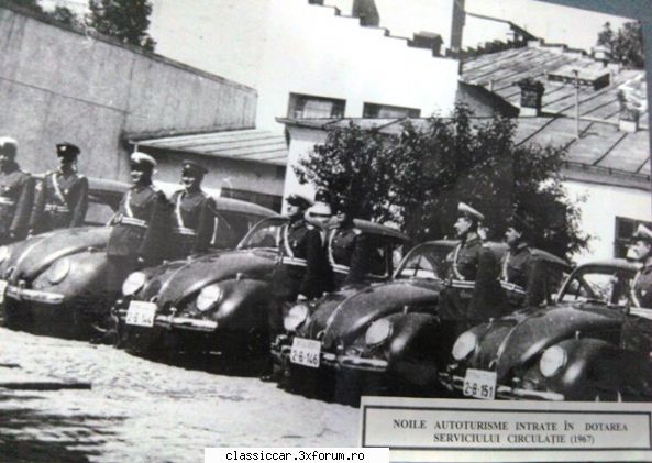 Vw kafer/broscuta politie - rand de militii...prima din stanga pare mai - Coltul Tehnic